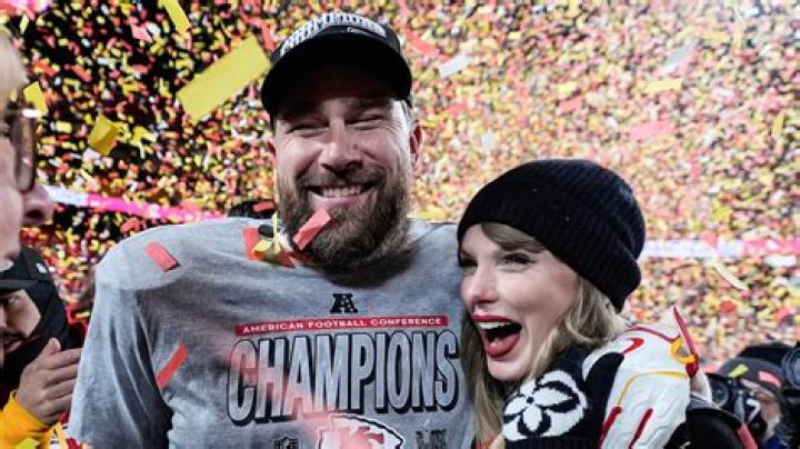 Taylor Swift spotted wearing T earrings and 87 Christmas hat during boyfriend Travis Kel